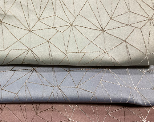 Jacquard déco tamisant avec motifs géométriques