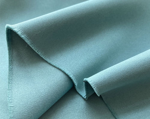Dim-out semi-blackout fabric with light satine effect