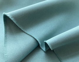 Dim-out semi-blackout fabric with light satine effect