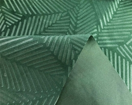 Velvet fabric with embossed leaves patterns